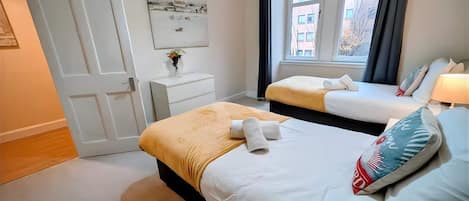 2 bedrooms, desk, iron/ironing board, travel crib