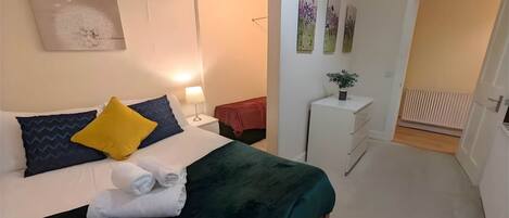 2 bedrooms, desk, iron/ironing board, travel cot