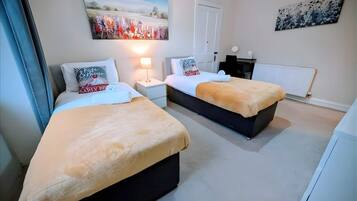 2 bedrooms, desk, iron/ironing board, travel cot