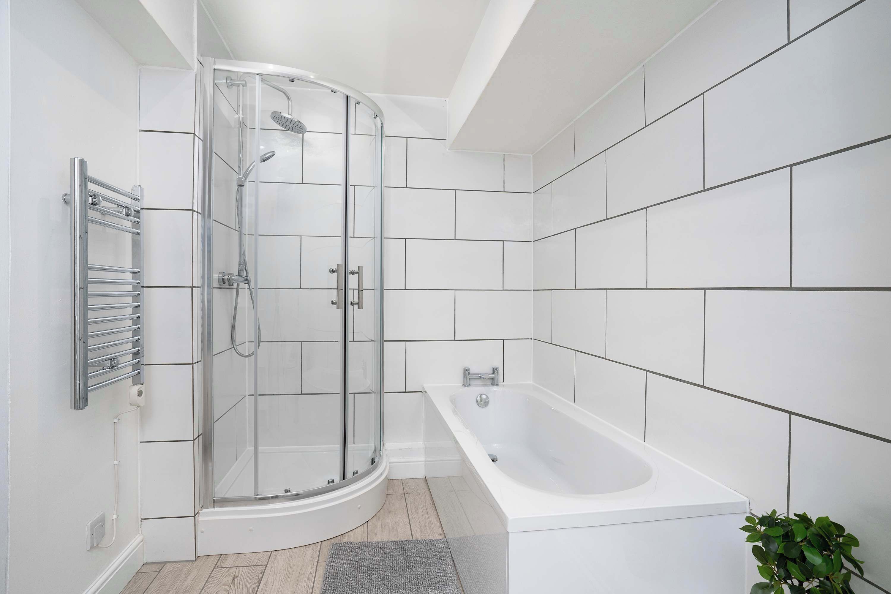 Shower, hair dryer, towels, shampoo