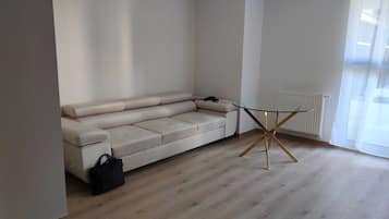 Studio, Patio | Living area