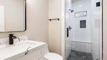Hair dryer, towels, soap, toilet paper