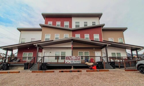 Sheik Top floor studio Unit 1 offers cozy boho vibe vaulted ceiling kitchenette!