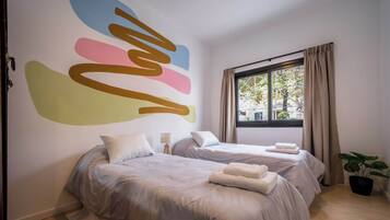 4 habitaciones, tabla de planchar con plancha, wifi y ropa de cama
