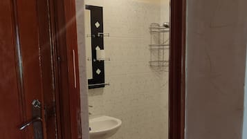 Ducha, toallas, jabón, shampoo