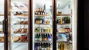A refrigerated display case with various food items and beverages. - Jyuni Hotel (Fukuoka)