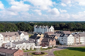 A residential area with a mix of modern and traditional architecture, including a prominent white building with a tower. - Towneplace Suites By Marriott Collierville (Collierville)