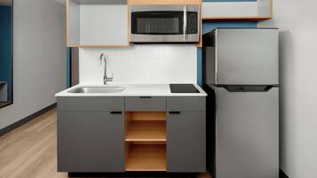 Studio Suite, 1 Bedroom | Private kitchen | Full-sized fridge, microwave, freezer, ice maker