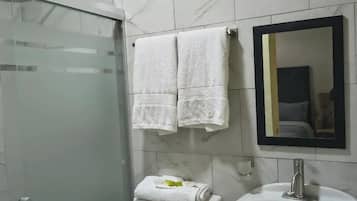 Shower, towels, soap, shampoo