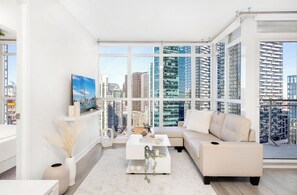 Deluxe Suite, 1 Queen Bed, Balcony, City View | Living area - The York Collective - Downtown Toronto (Toronto)