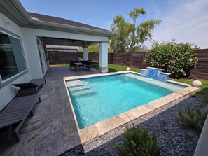 Outdoor pool, a heated pool - LUXURY, FINELY FURNISHED 3 BEDROOM 3.5 BATH, COVERED PADIO & POOL BROWNSVILLE TX (Brownsville)