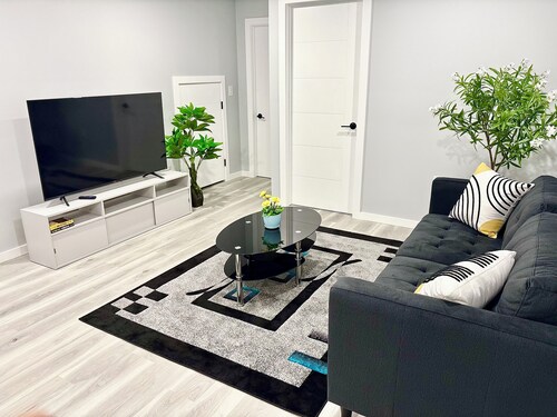 Spacious Entire Basement Suite + Parking | Self Check-In + Wi-Fi