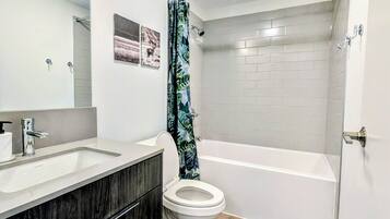 Hair dryer, towels, soap, shampoo