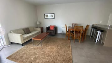 Deluxe Apartment, Patio, Ocean View | Living area