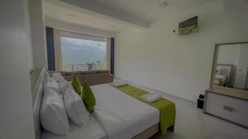 Deluxe Studio, 1 King Bed, Balcony, Mountain View | Desk, laptop workspace, iron/ironing board, free WiFi