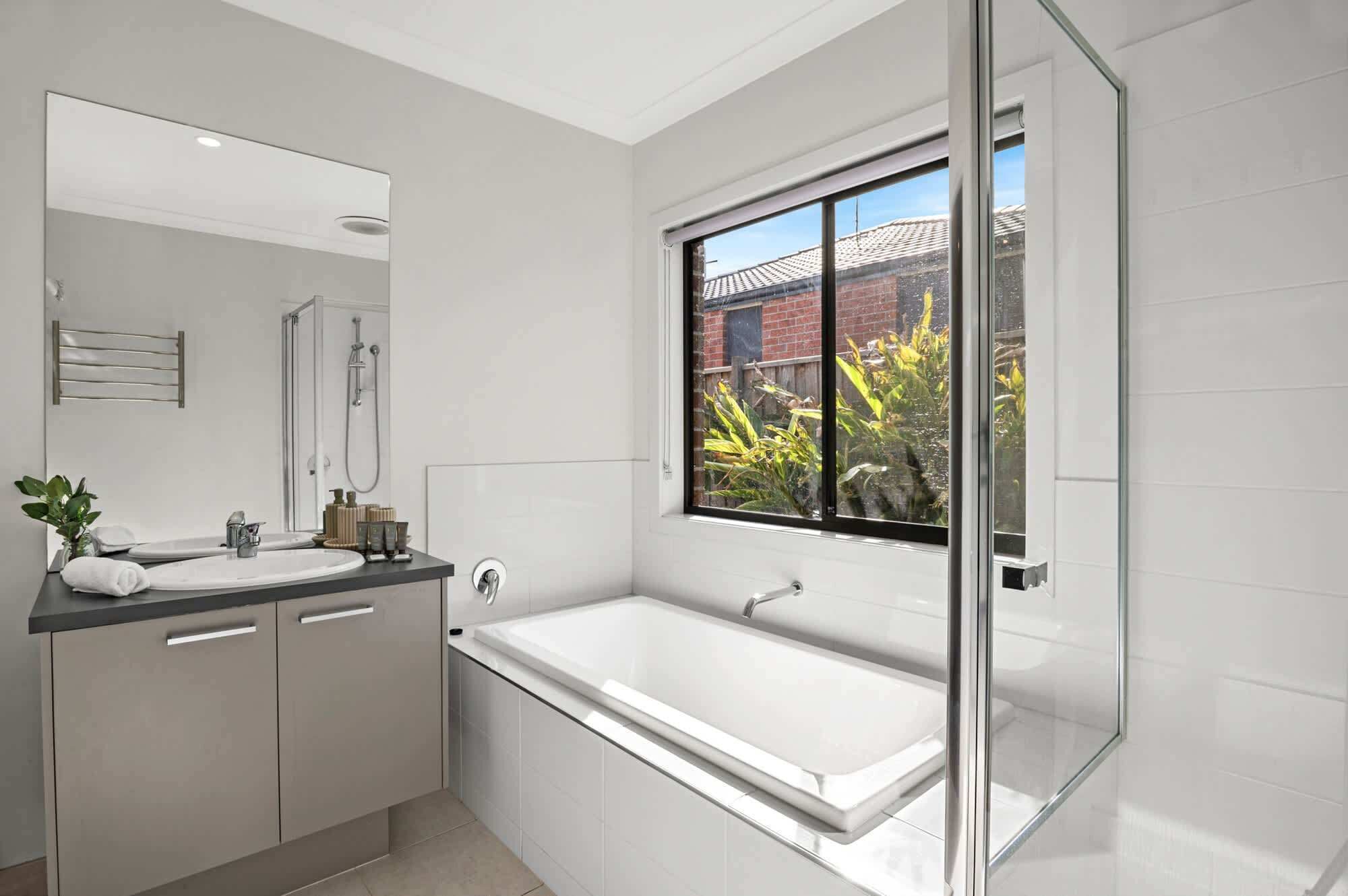Shower, hair dryer, towels, shampoo