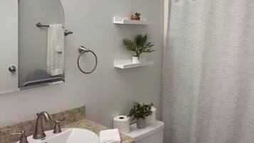 Hair dryer, towels, soap, toilet paper