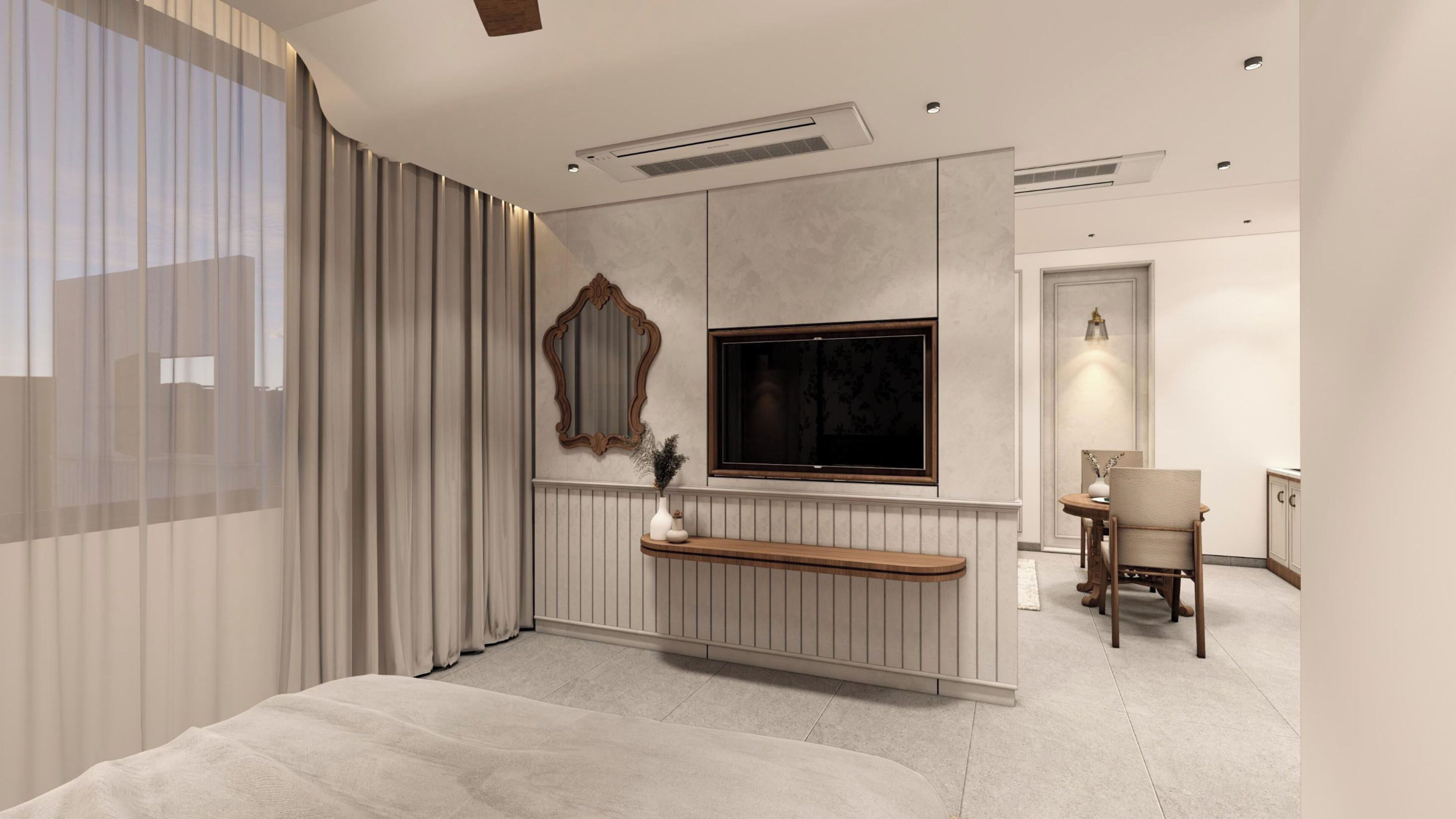 A modern hotel room with a bed, a TV, a seating area, and a bathroom.