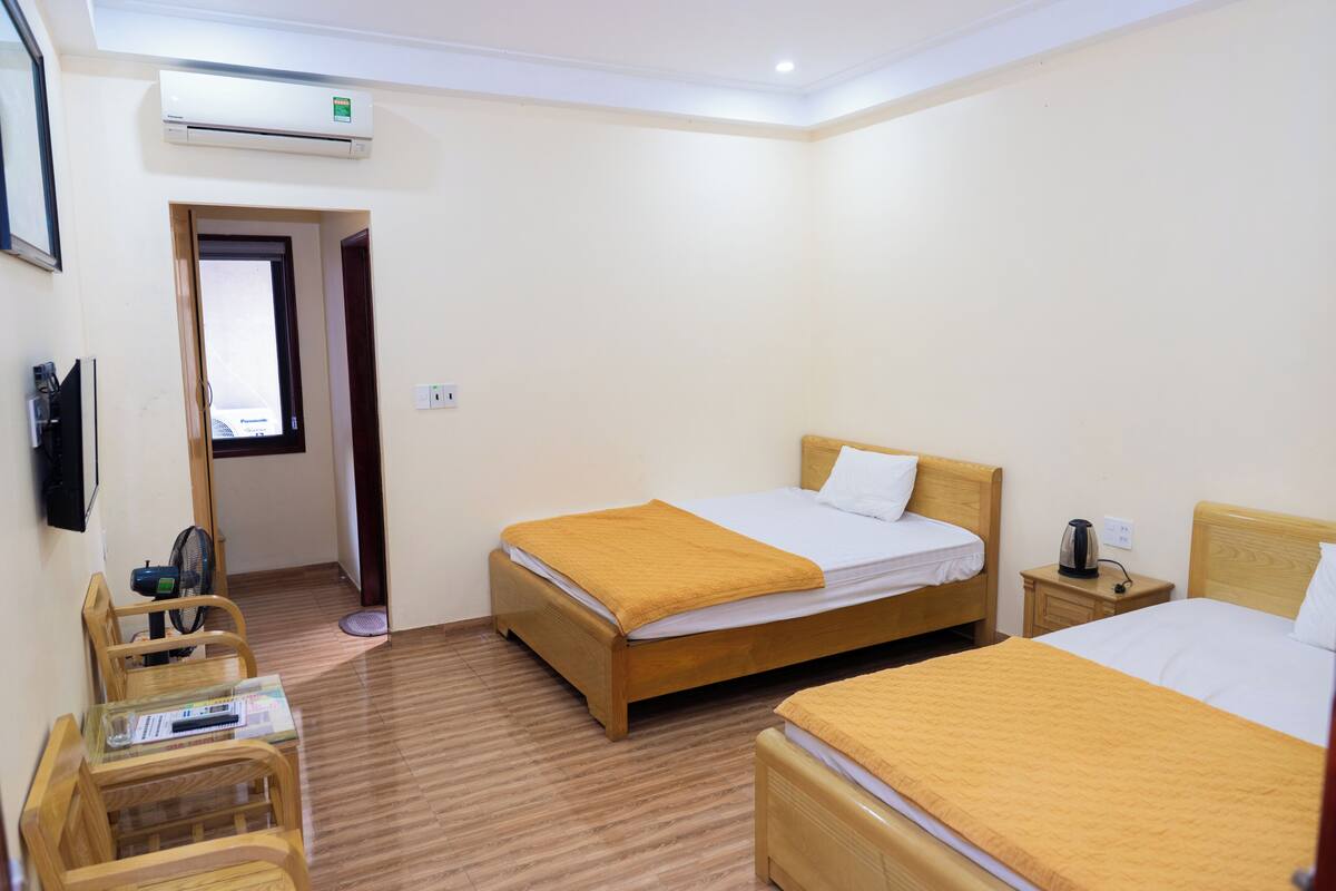 Quarto triplo standard, vista para a cidade | Vista para a cidade