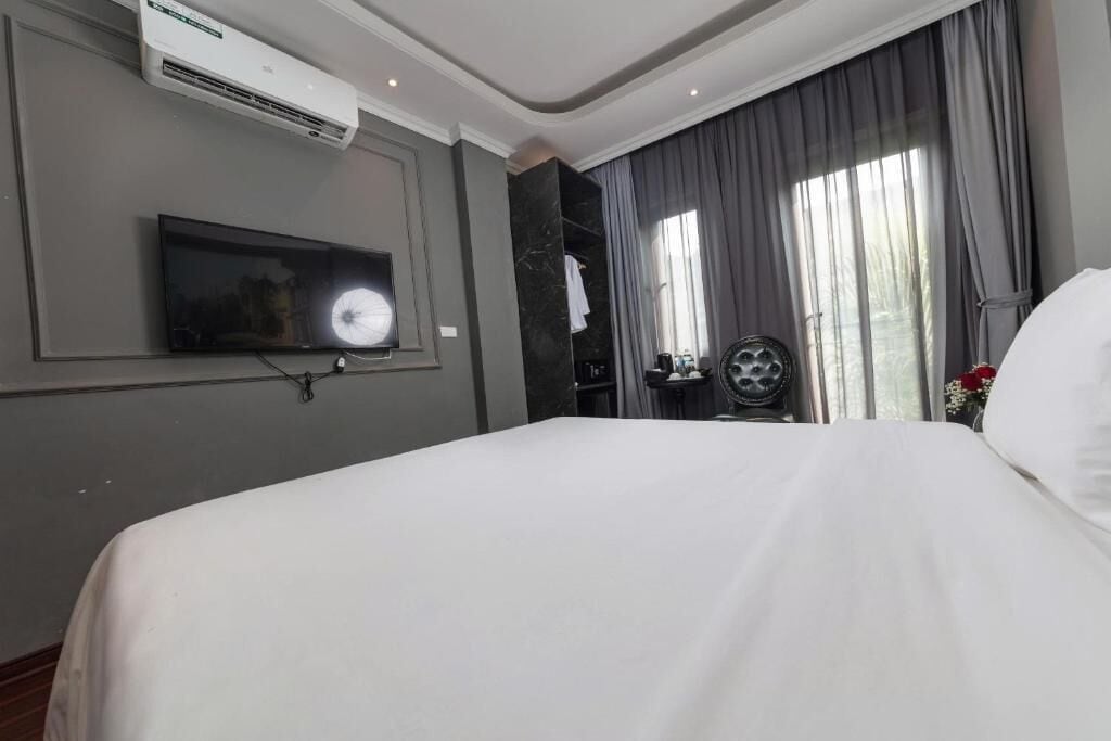 Habitación Deluxe con 1 cama doble o 2 individuales | Caja fuerte y wifi gratis