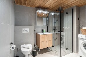 Apartment, 1 Queen Bed with Sofa bed | Bathroom | Shower, hair dryer, bidet, towels