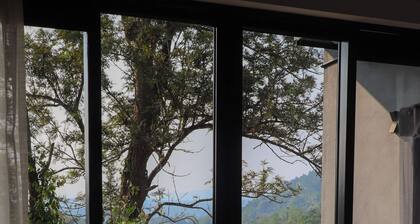 Unwind in secluded luxury at The Ridge House. Perched high above the Kandy,