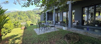 Unwind in secluded luxury at The Ridge House. Perched high above the Kandy,