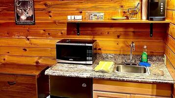 Fridge, microwave, coffee/tea maker, dining tables