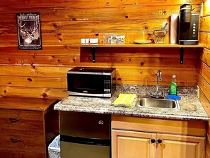 Fridge, microwave, coffee/tea maker, dining tables - Pet-Friendly Cabin Rental for Two along River near Thompson Falls, Montana (Thompson Falls)