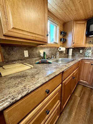 Fridge, stovetop, dining tables