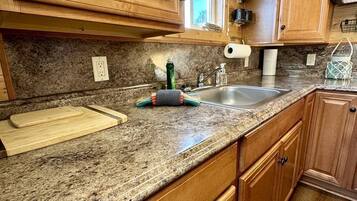Fridge, stovetop, dining tables