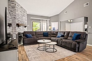 TV, fireplace - Extended Stay Comfort | Prime Location + Garage (Carrollton)
