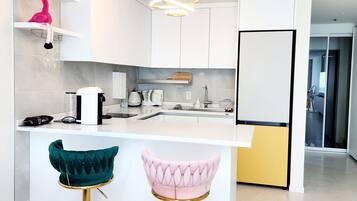 Fridge, microwave, coffee/tea maker, electric kettle