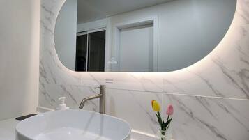 Hair dryer, towels, soap, toilet paper