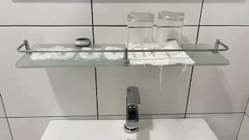 Shower, free toiletries, towels, soap