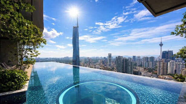 A rooftop infinity pool with a city skyline view, including a tall skyscraper and a tower. - Lucentia Residence Bukit Bintang Lalaportbbcc By Vellora (Kuala Lumpur)