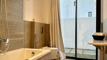 Shower, hair dryer, towels