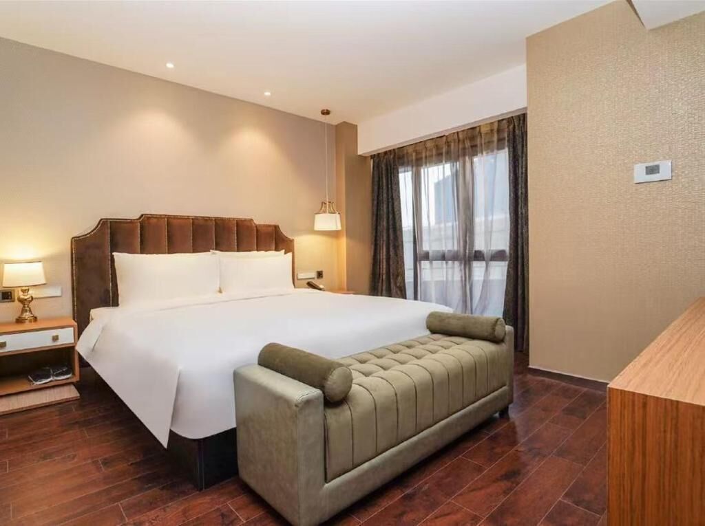 Quarto luxo, vista para a cidade