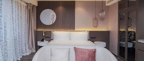 Down comforters, free minibar, blackout drapes, soundproofing