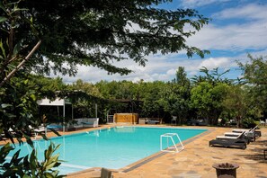 Outdoor pool, open 8:00 AM to 6:00 PM, pool umbrellas, sun loungers