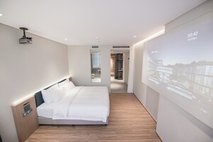 Premium bedding, down duvets, memory-foam beds, free minibar