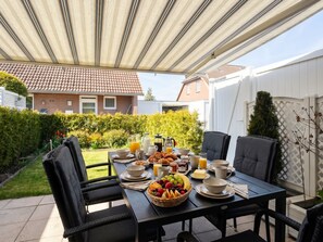 Outdoor dining - Family vacation home on the Baltic Sea by "Momentic" - Küstenperle Haffkrug - dein (Scharbeutz)