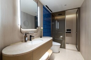 Hair dryer, slippers, towels, shampoo