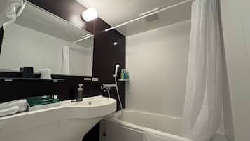 Combined shower/tub, free toiletries, hair dryer, slippers