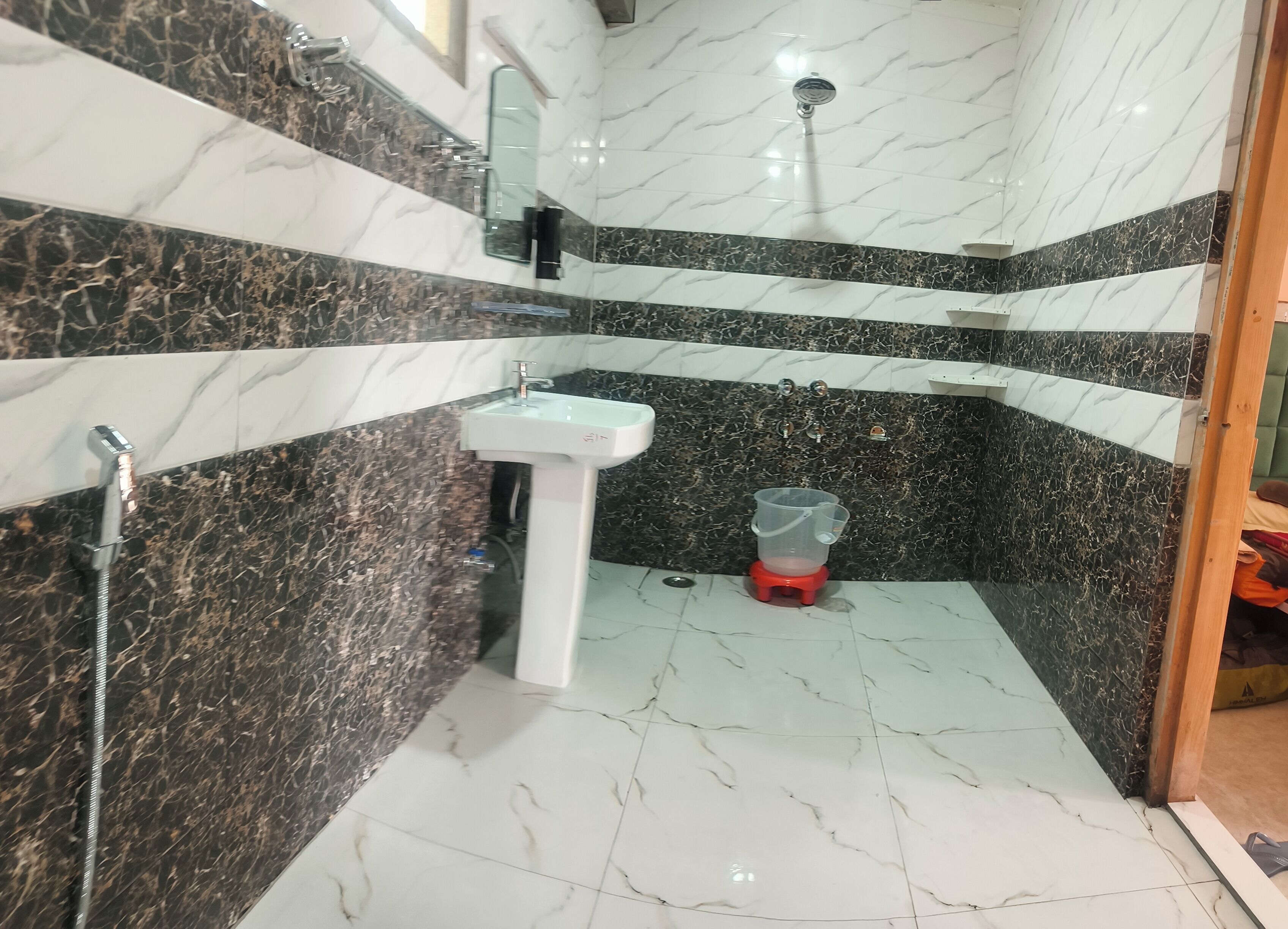 Shower, towels, soap, toilet paper