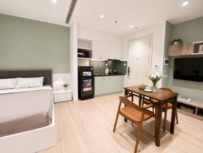 Superior Studio | Living area | 55-inch Smart TV with digital channels - Joy Apartment Pearl West Lake (Tay Ho)