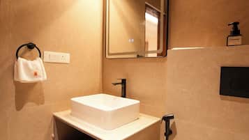 Shower, free toiletries, hair dryer, slippers