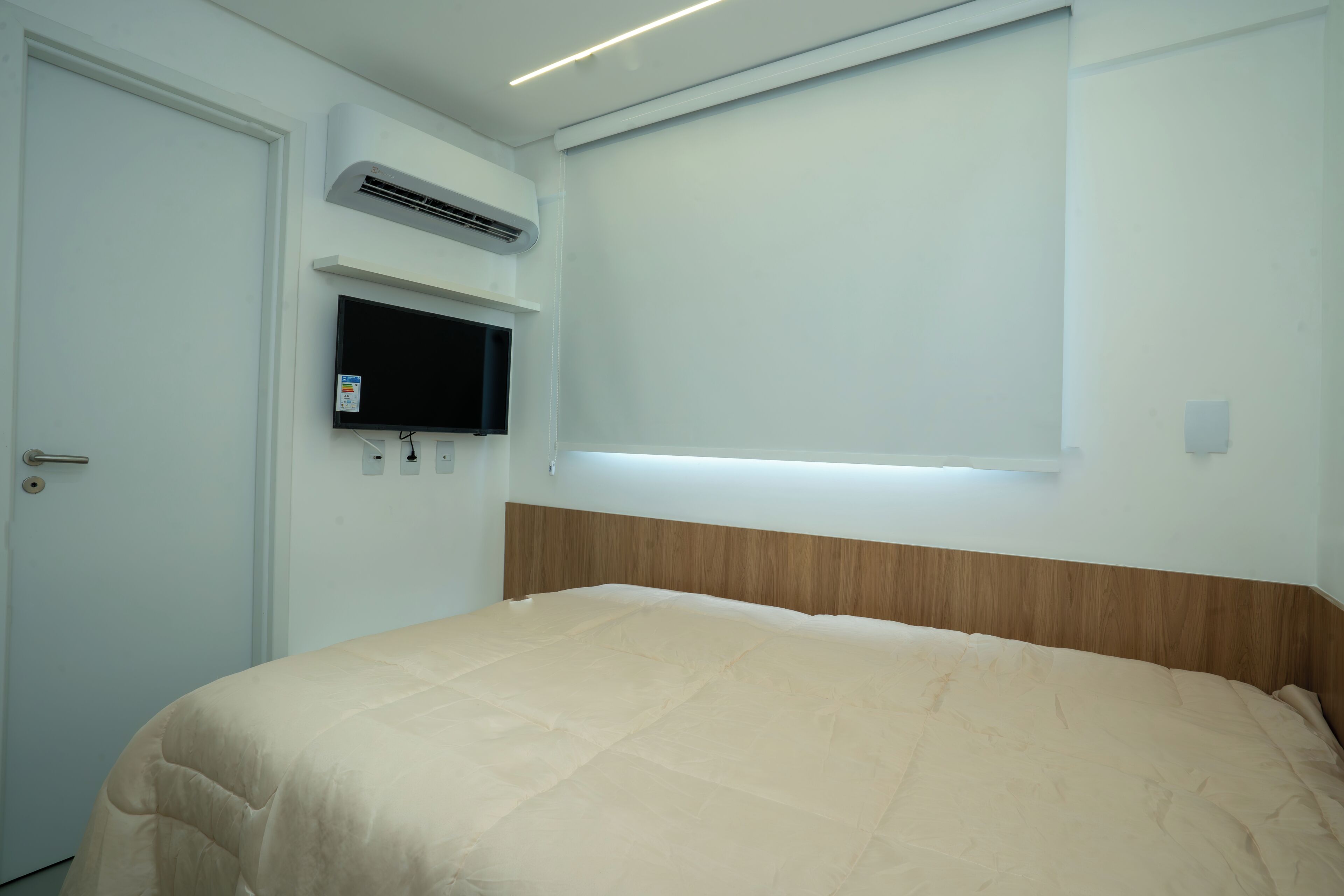 Apartamento conforto, vista para a cidade | Cortinas blackout, ferros/tábuas de passar roupa, Wi-Fi de cortesia