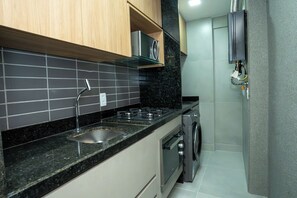 Comfort Apartment, City View | Private kitchen | Electric kettle - Flat Praça do Parnamirim by Easy Home (Recife)