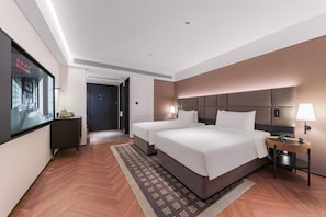 Deluxe Twin Room | Down duvets, memory-foam beds, minibar, desk